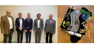 Herr Dorpmüller mit Prüfern / Doktorhut